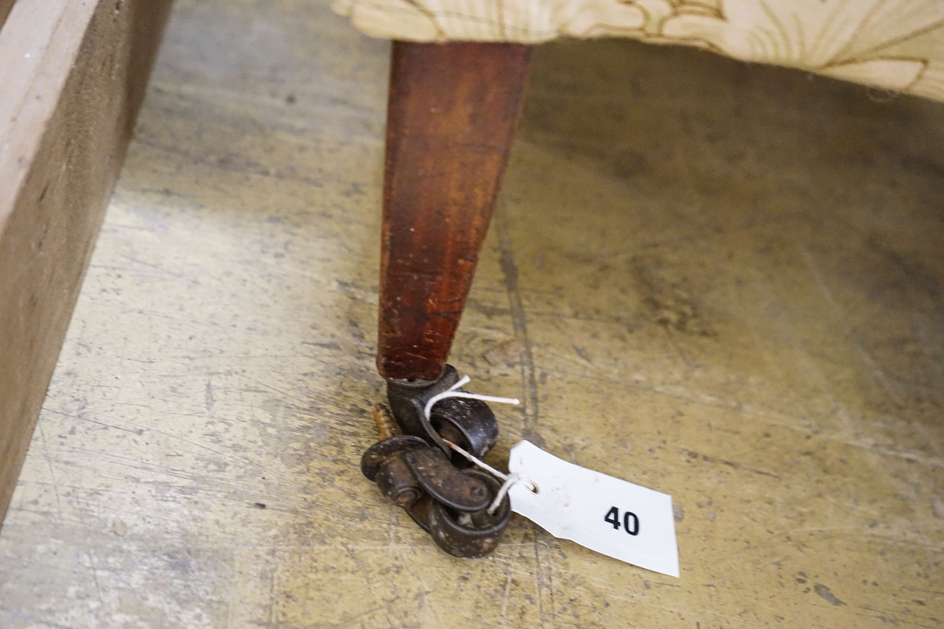 A George III mahogany child's armchair, with square tapered legs fitted brass castors, width 49cm, depth 48cm, height 78cm